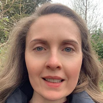 Head-and-shoulders portrait of Kate Fussell, Membership Officer for the NHS Retirement Fellowship. She is smiling and dressed in smart-casual attire, standing outside against a neutral background.