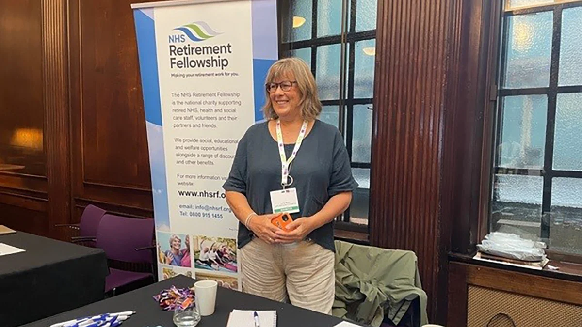 Lynda McKie standing with the NHSRF display at the RCN Retired Members’ Conference in London