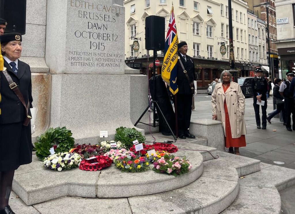 Ros Lobos standing alongside the statue commemorating Edith Cavell